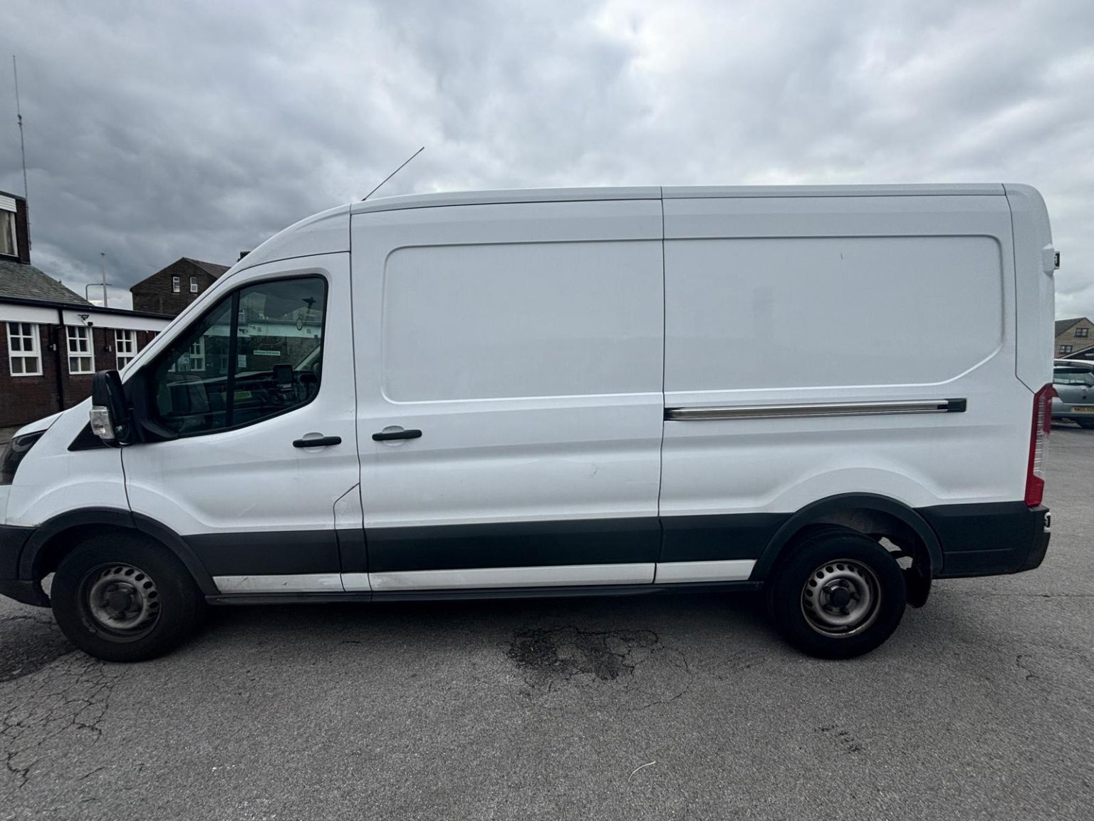 Man with a van Bradford – white Ford Transit long wheelbase removals van, side view